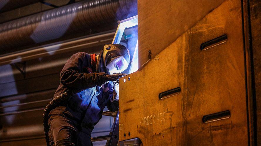 Person using a welder.