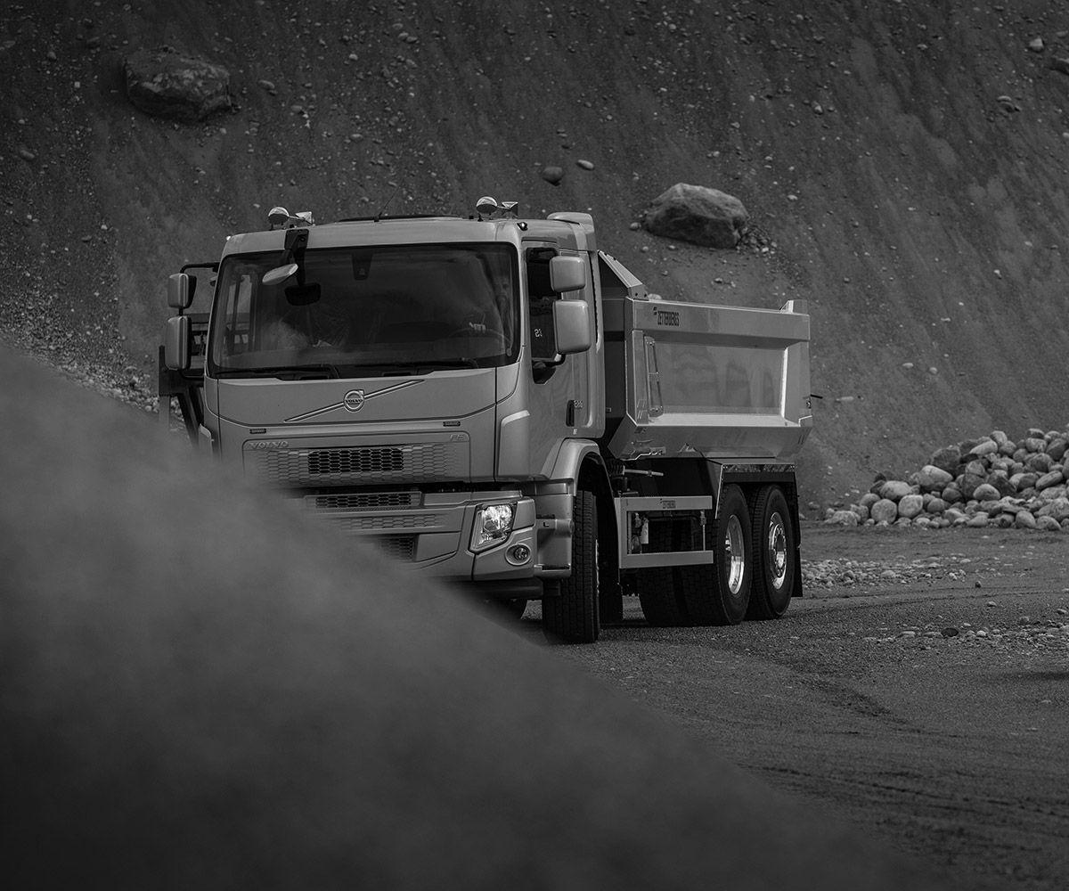 Black and white image of a truck.